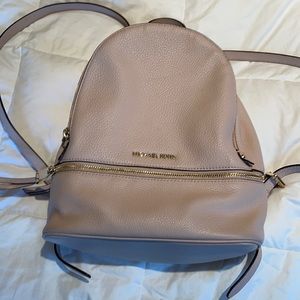 Michael Kors pink and gold backpack